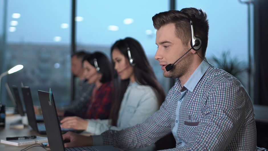 Call centre workers on the phone