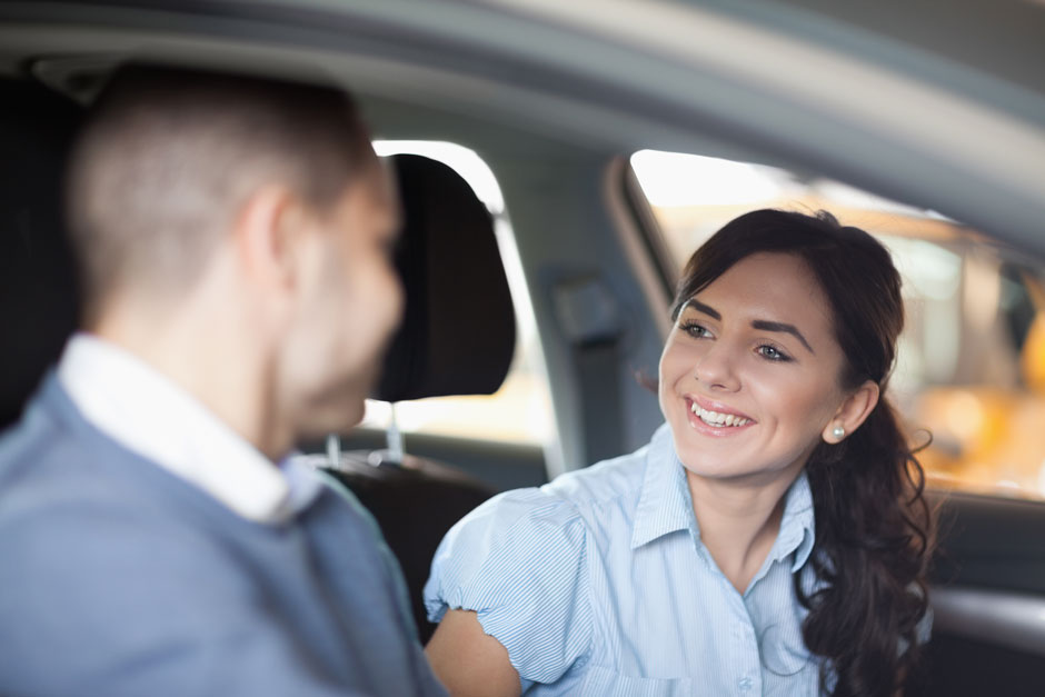 Pupil in car with her instructor