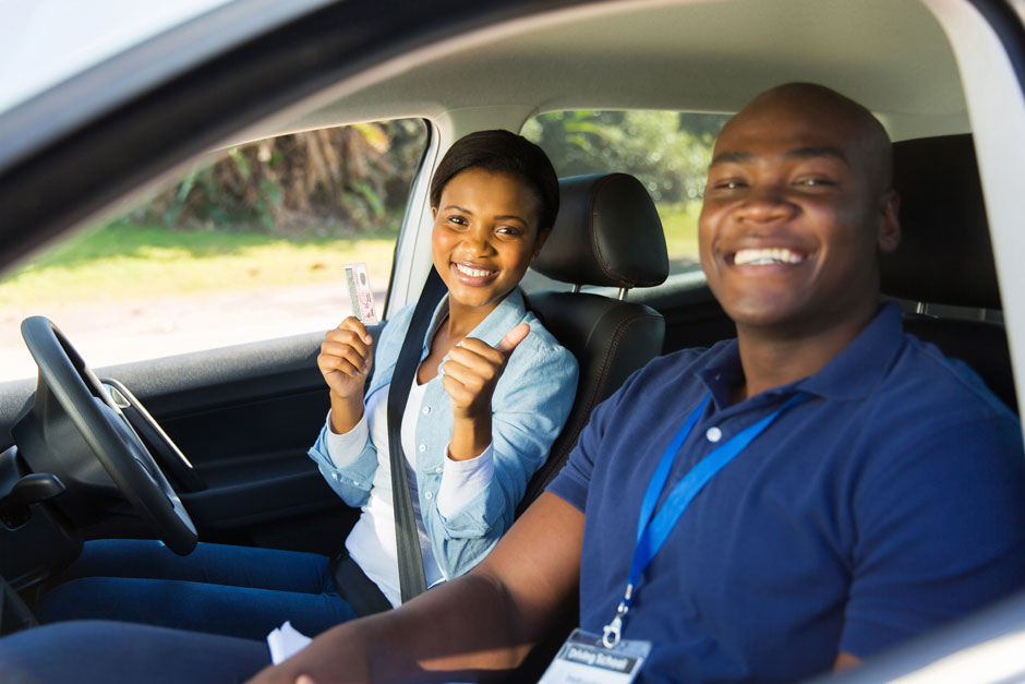 Woman happy after passing her driving test